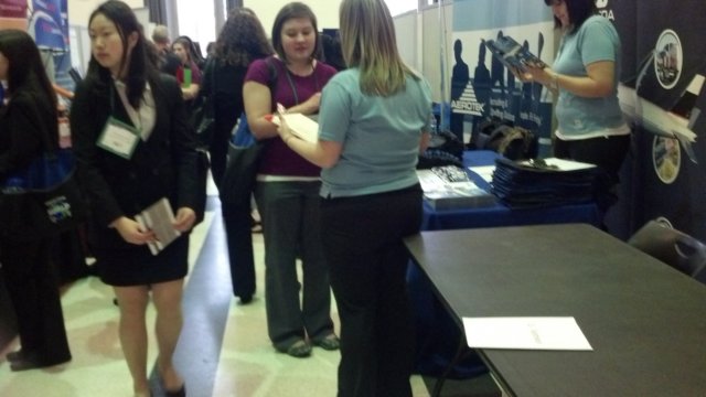 mncareerfairboothsinoneroom.jpg